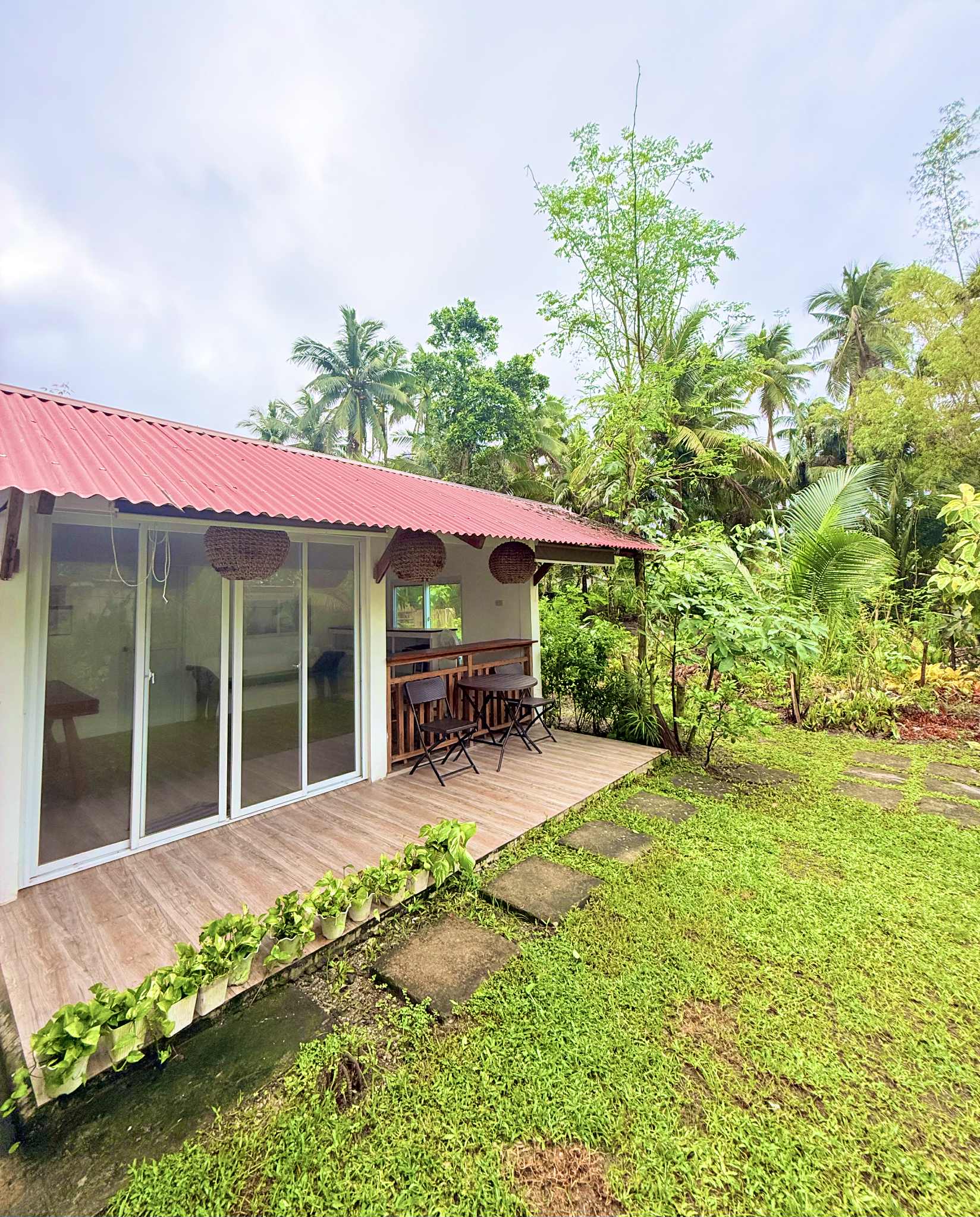 Cabin nestled among tropical greens