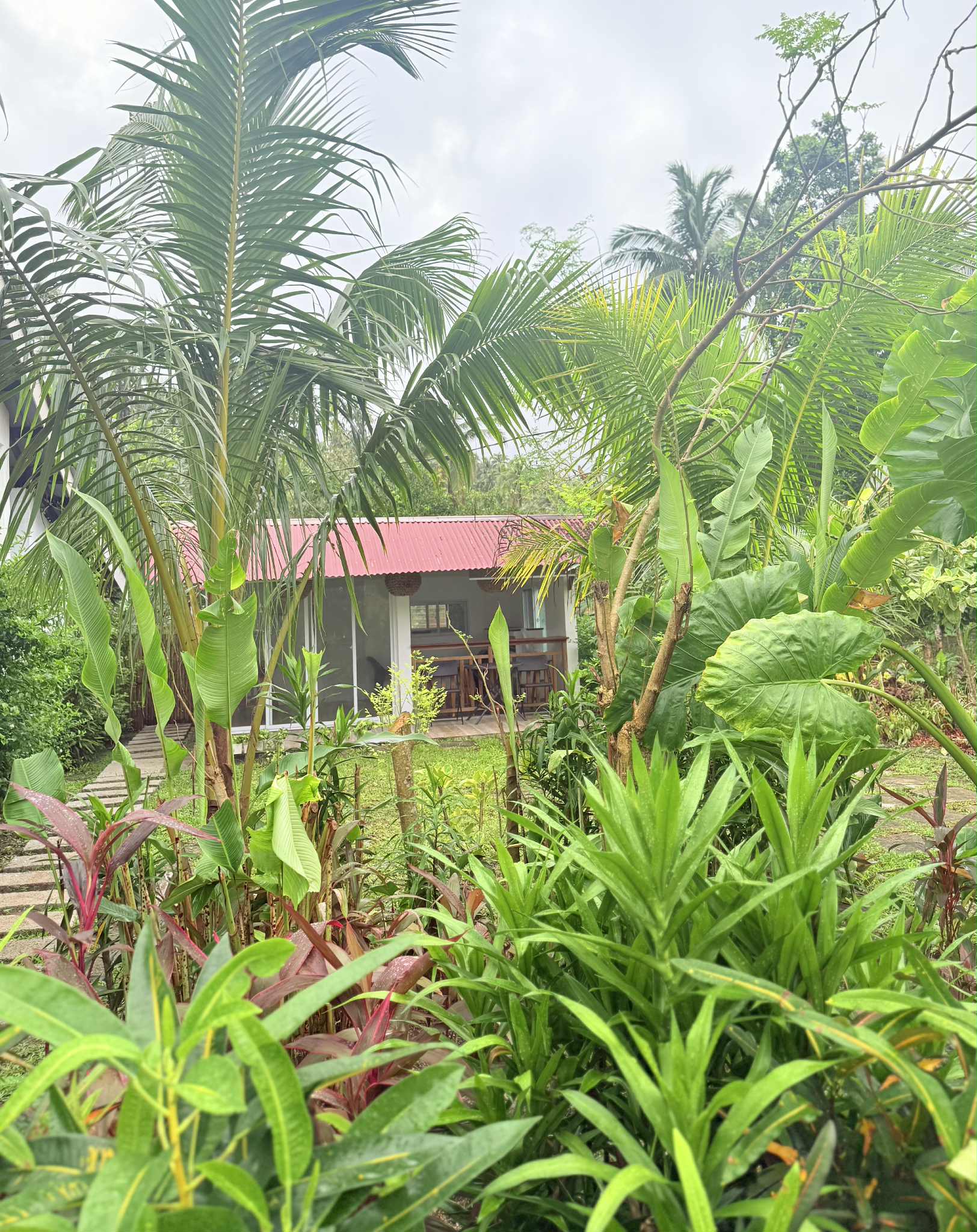 Cabin veranda with seating overlooking the garden